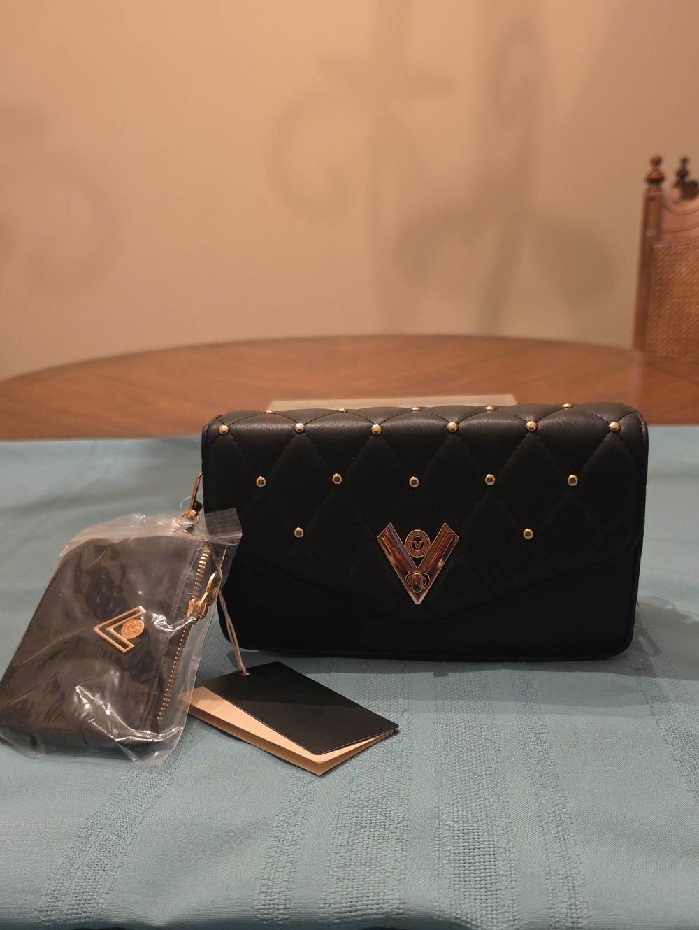 Valentino Orlandi Quilted Black Crossbody Purse with Gold Stud Accents.